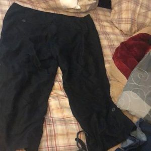 Capri pants that can be buttoned into short